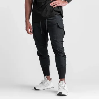 Новые камуфляжные спортивные брюки 2021 года, мужские брюки для фитнеса, летние Тонкие свободные быстросохнущие эластичные спортивные брюки для бега Изображение
