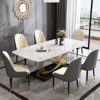 Обеденный стол из роскошного камня, современная золотая рама, сочетание обеденного стола и стула от высококлассного дизайнера Изображение